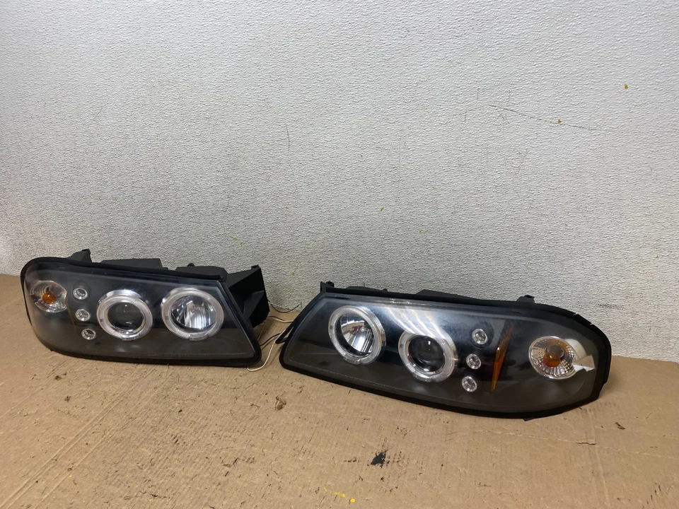 Juego faros halógenos izquierda+derecha Chevrolet Impala 2000-2005 Q2875 DG Foto 2 de 4