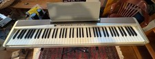 Casio Privia PX-120 digital piano 88 weighted keys, power plug, sheet music rest