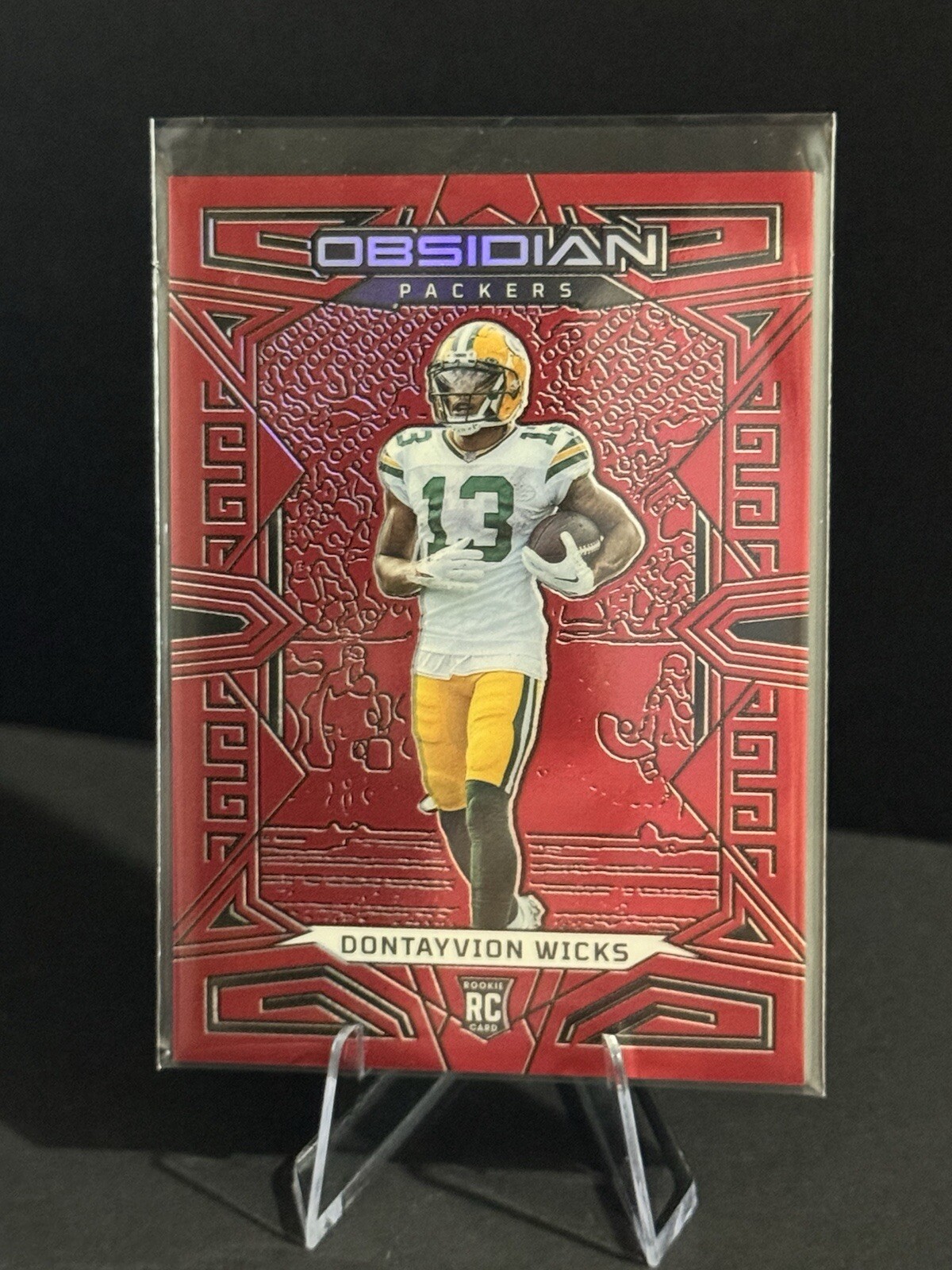 2023 Panini Obsidian DONTAYVION WICKS Red Flood 35/90 RC Rookie #138 PACKERS