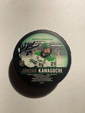 North Dakota Fighting Hawks JORDAN KAWAGUCHI Signed Hockey Puck SIOUX