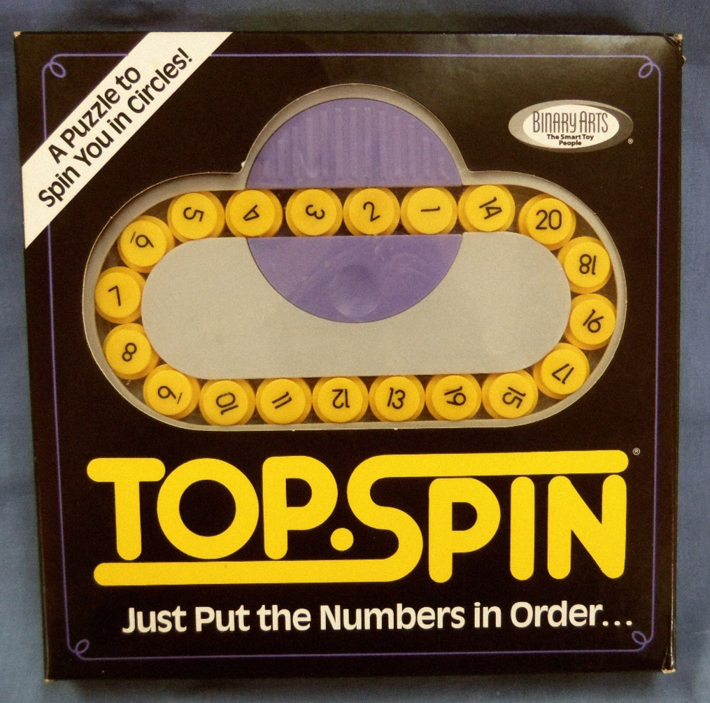 Top.Spin puzzle by Binary Arts - handheld brain teaser game, in