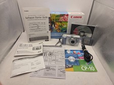Canon PowerShot A10 1.3MP 3x Zoom Digital Camera W/ Box SD papers TESTED WORKS