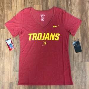 red and yellow nike shirt