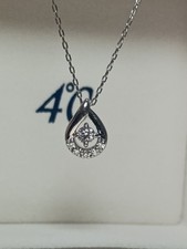 4  Platinum Diamond Drop Motif Necklace with a Single Diamond