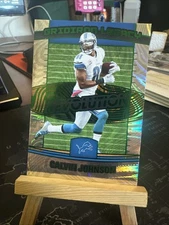 2025 Panini Revolution Calvin Johnson /25 Green Swirl Gridiron Legacy Lions 15