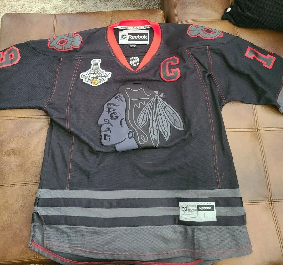 Black toews jersey cheap