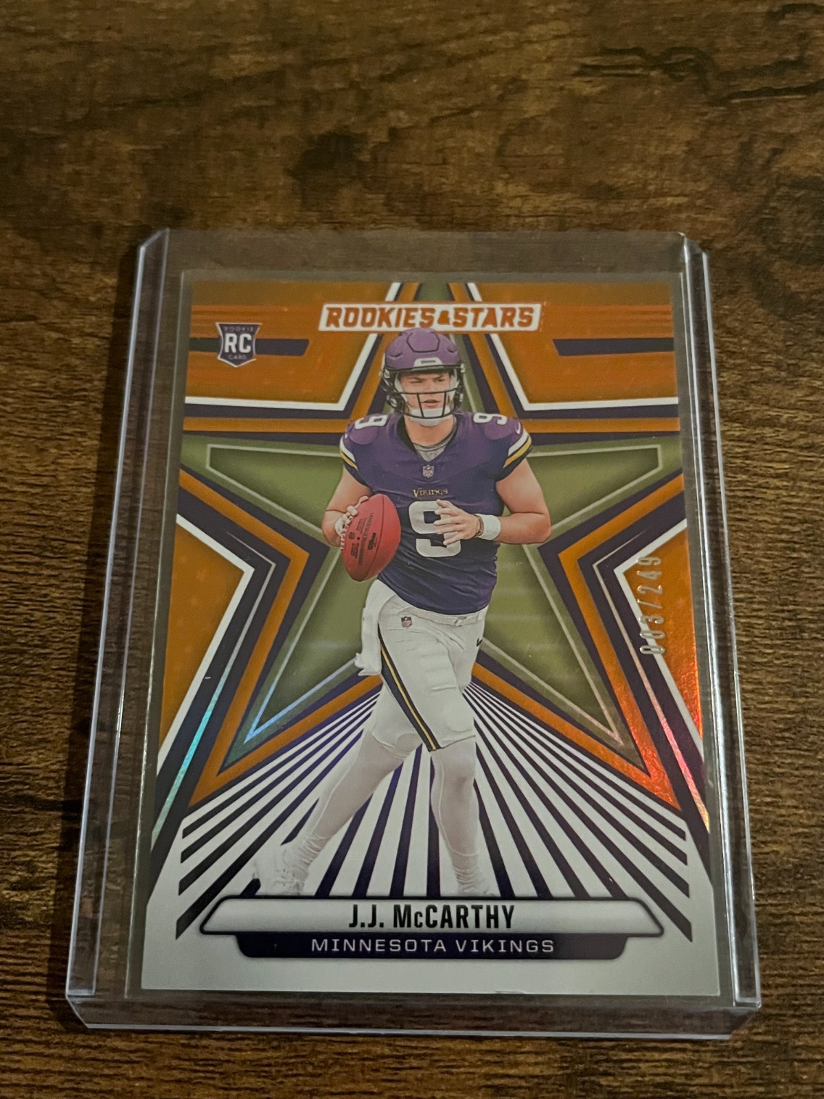 2024 Panini Rookies & Stars - Rookies J.J. McCarthy #135 Orange /249 (RC)