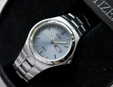 Citizen Eco Drive Men's Watch Solar Ice Blue Dial Bracelet Date WR100 Boxed