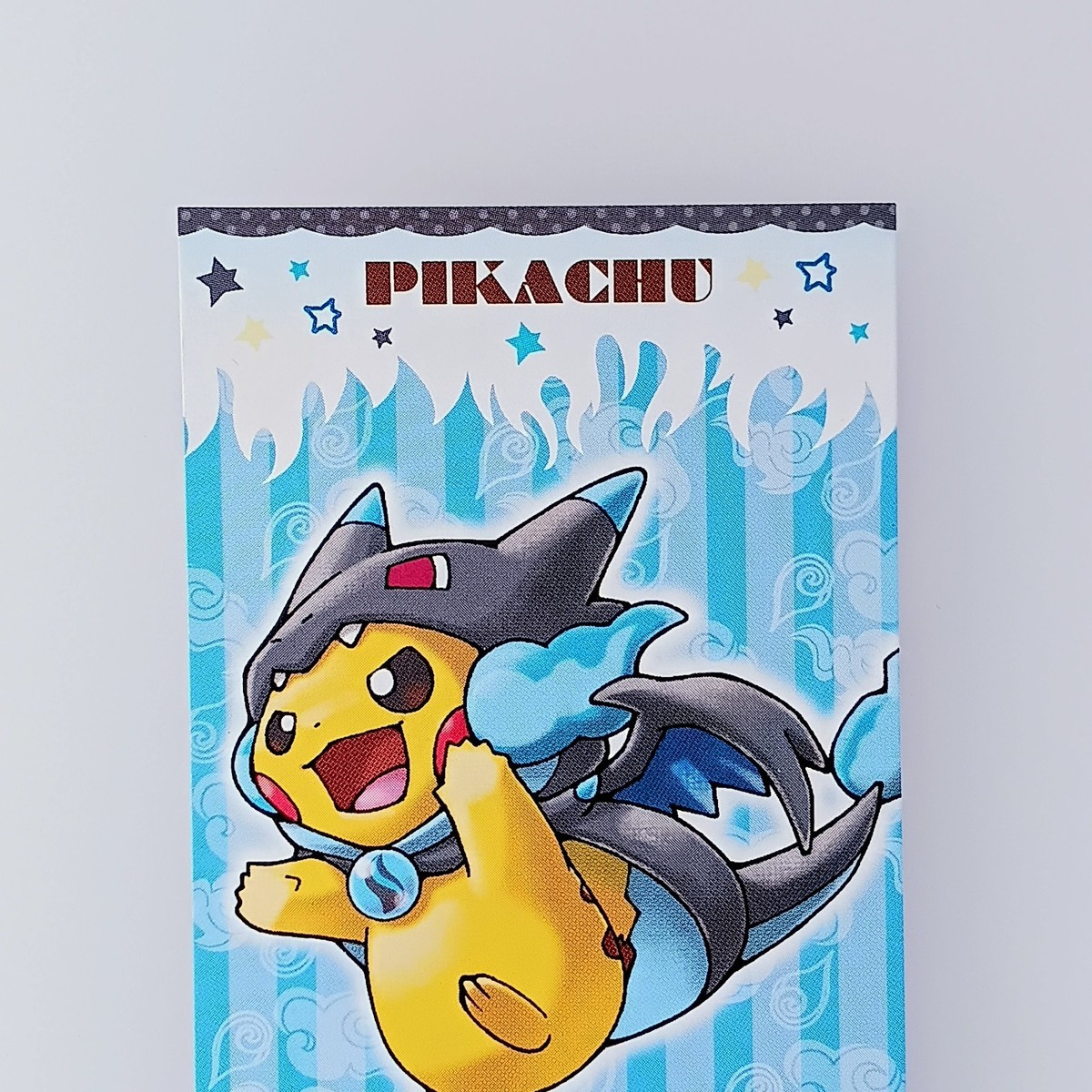 Pikachu with Mega Charizard X Poncho Pokemon Center Business