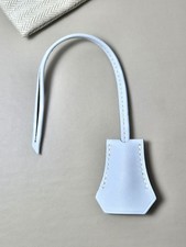 Clochette Hermès bleue pâle pour sac Kelly & Birkin 25