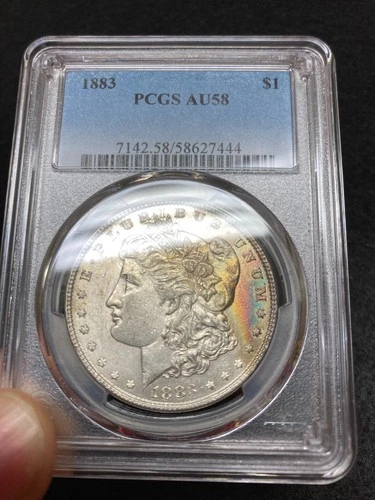 1883-P PCGS AU58 Morgan Dollar w/ Vibrant Rainbow Toning & Wonderful Eye Appeal