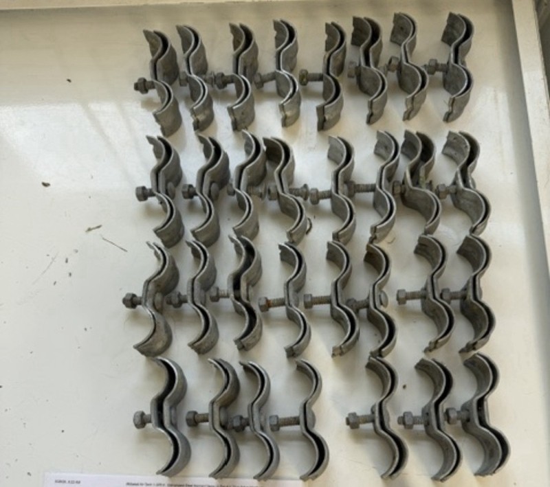 Used 32 Pair of Galvanized Steel Kennel Saddle Clamps 1-3-8 Inch
