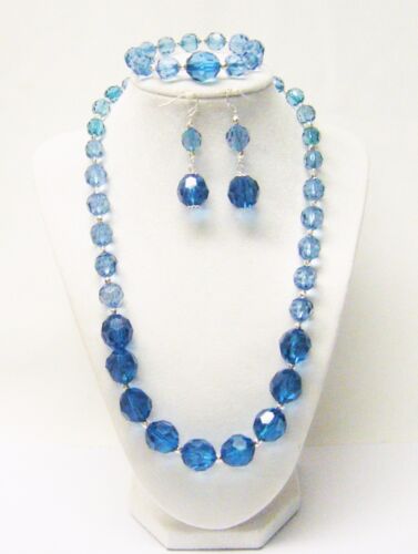 Collier/bracelet/boucles d'oreilles en perles acryliques transparentes à facettes bleu sarcelle  - Photo 1/9