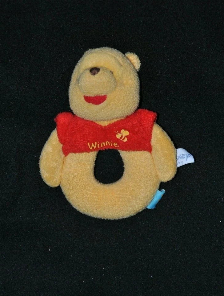 Peluche doudou Winnie DISNEY BABY jaune rouge abeille hochet grelot TTBE - Photo 1/1