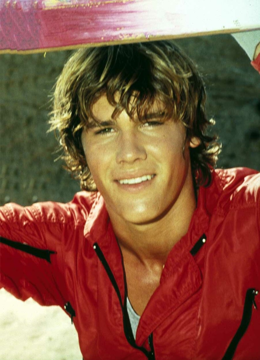 Thrashin Josh Brolin as Corey Webster handsome smiling in red
