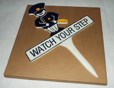 VINTAGE NOS CAST METAL WATCH YOUR STEP SIGN READ!!
