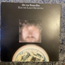 ELO ON THE THIRD DAY LP 1973 UK WARNER BROS A1B2 DIE-CUT TRIPLE GATEFOLD EX+/VG+