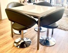 Dwell extendable dining table with 4 chairs