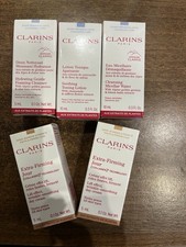 CLARINS Travel Set, 2 10ml Toner, 1 5ml Cleanser and 2 5ml Day Cream
