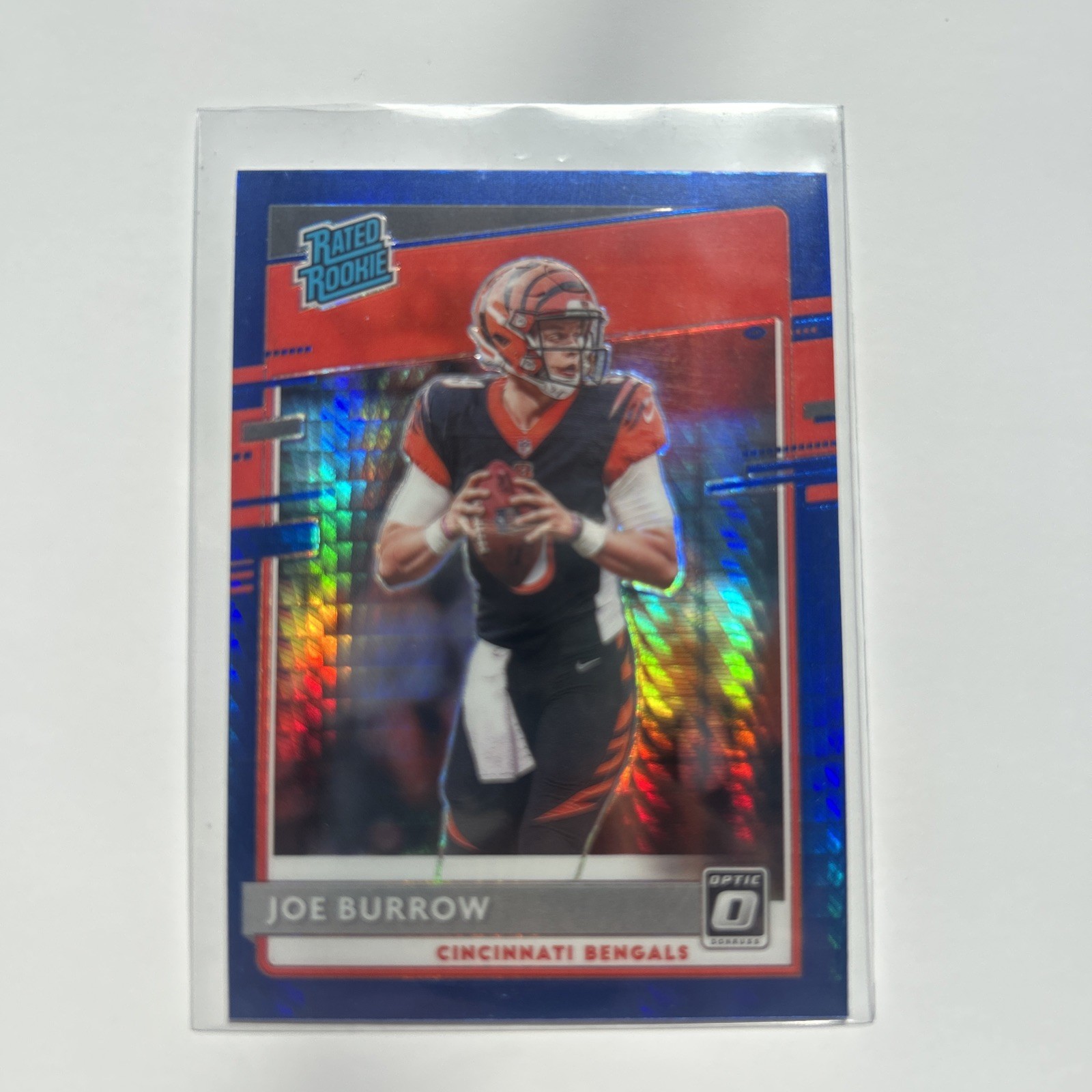 2020 Panini Donruss Optic Joe Burrow Blue Hyper #151 Rookie Card.