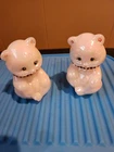 2 Fenton iridescent signed bears with necklaces