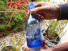 Pontiled New Orleans soda bottle