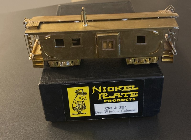 HO brass Nickel Plate CM&StP Bay Window Caboose