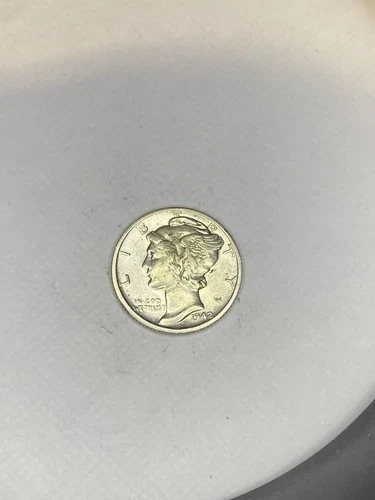 1942 s Mercury Dime looks to be au/unc you grade #340