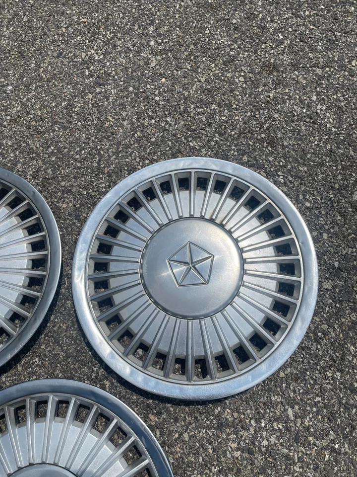 Factory 1984 to 1986 Plymouth Caravelle Voyager LeBaron 14 inch hubcaps - Image 4 of 4