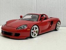 JADA 2005 PORSCHE CARRERA GT RED W/ CHROME WHEELS 1:24 DIECAST MODEL NEW NO BOX