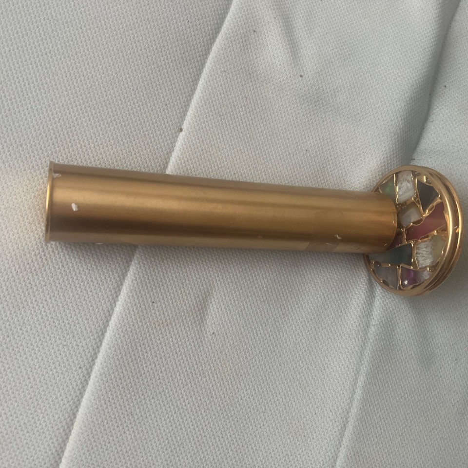 A dual-wheel brass kaleidoscope is a rare, mesmerizing upgrade over the standard single-wheel — genuinely unusual find.