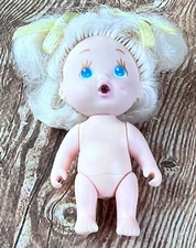 1990 Tyco Quints Bottle Baby Blond Girl Doll
