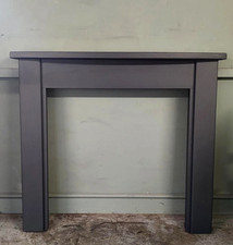 A Beautiful Wooden  Charcoal Black Fireplace Mantle Surround