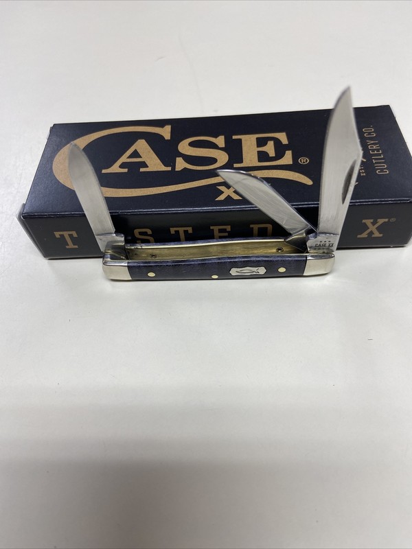 CASE XX #80547 PURPLE CURLY MAPLE SMOOTH SMALL STOCKMAN SS