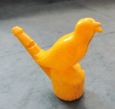 Vintage yellow plastic bird water warbler whistle