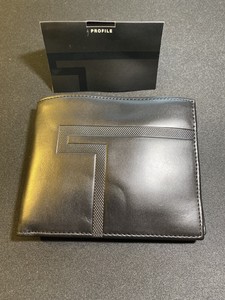 tumi checkbook cover