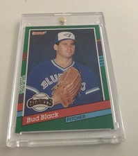 1991 Donruss Bud Black #719 Rookie Error Card White And Pink Dot Above The U & E. rookie card picture