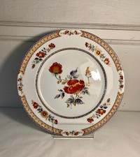 Manufacture royale de Limoges. Assiette en porcelaine Fleurs polychromes.
