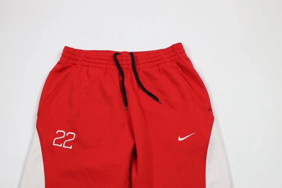 Pantalones deportivos vintage Nike para hombre grandes desgastados Travis Scott Mini Swoosh pierna ancha Foto 2 de 4
