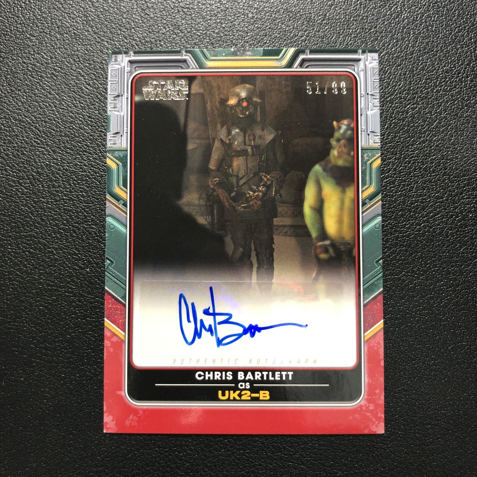 2022 Topps Star Wars the Book of Boba Fett Auto Chris Bartlett UK2-B Red /99