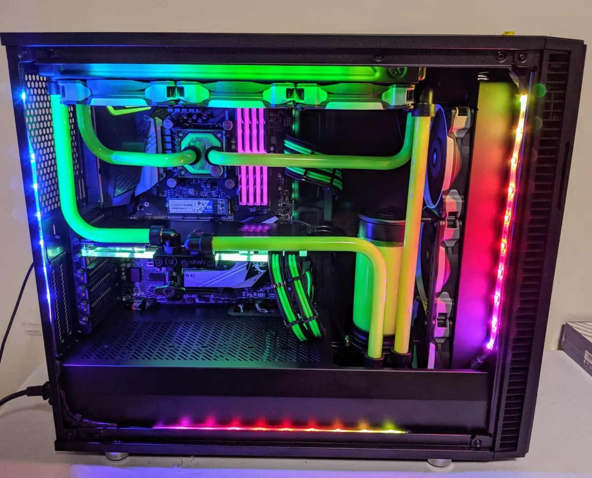 black custom gaming pc computer with glass windows and colorful