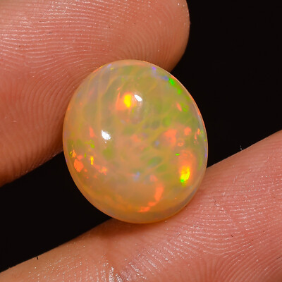 natural ETHIOPIAN OPAL oval Translucent loose gemstone 5.45 Carat. (12x14x06 mm)