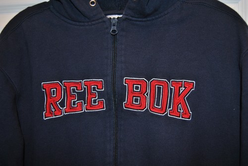 NUEVA SUDADERA CON CAPUCHA AZUL REEBOK EN GRANDE (14-16) CON LETRAS ROJAS BORDADO - Imagen 2 de 3