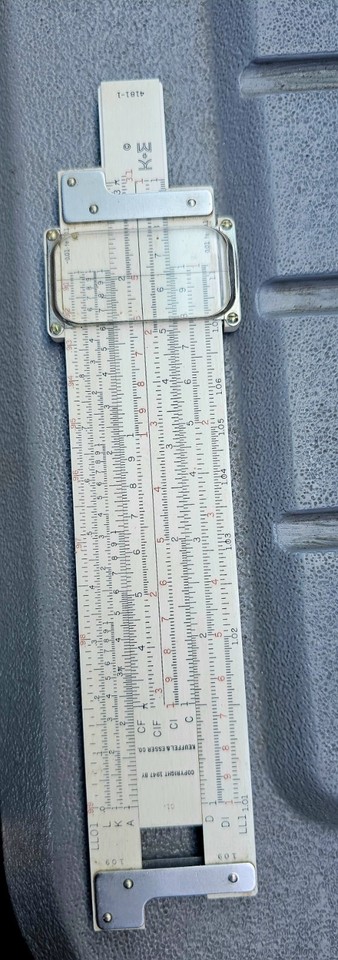 A Keuffel & Esser Log Log Duplex Decitrig — the gold-standard American slide rule brand that engineers swore by before calculators killed the category.