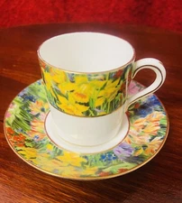 Antique Paragon Star Springtime Demitasse Cup and Saucer 8485-1920’s