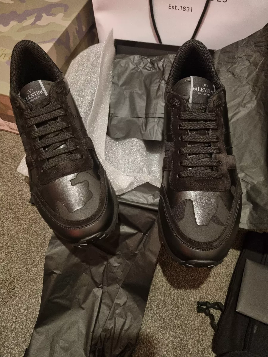 Triple black top valentino trainers