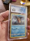 CGC 8.5 NM/MINT+ Psyduck Detective Pikachu Holo Pokemon Card 7/18