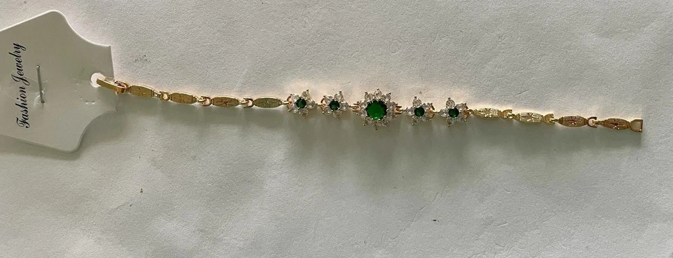 Brazalete de tenis para mujer de esmeralda simulada de corte redondo de 6 quilates enchapado en oro amarillo de 14 k Foto 2 de 4