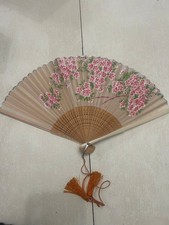 Vintage Japanese folding hand fan with cherry blossom motif