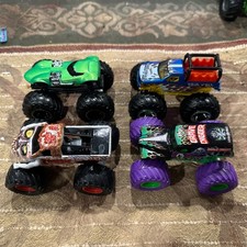 Lot of 4 Hot Wheels Monster Jam Trucks 1:64 Scale Grave Digger, Zombie And More